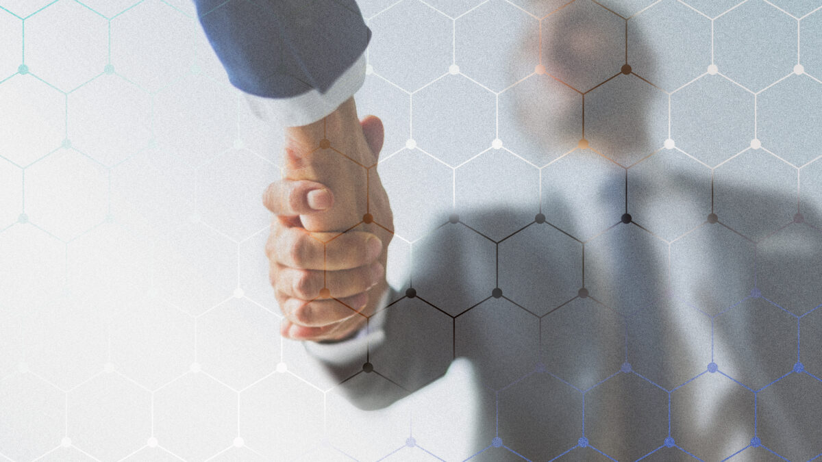 Corporate business handshake between partners